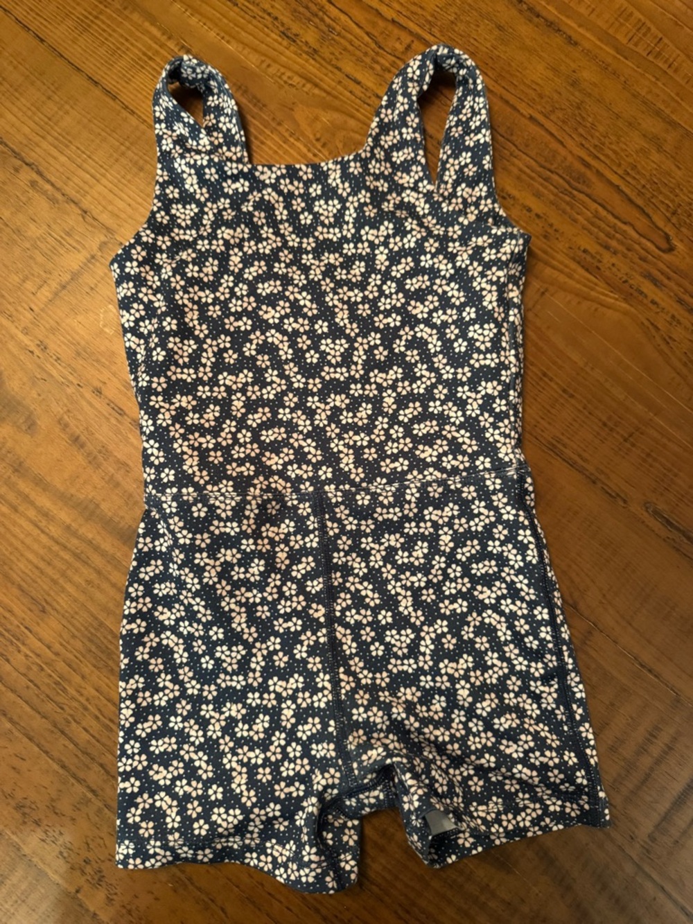 Rylee + Cru Navy Tank Romper with Cream Daisy Pattern